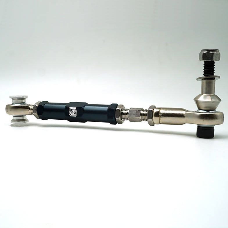 Suspension Secrets adjustable rear camber arms for BMW G87 M2, part of the kinematics kit, with black metal construction and mounting points.