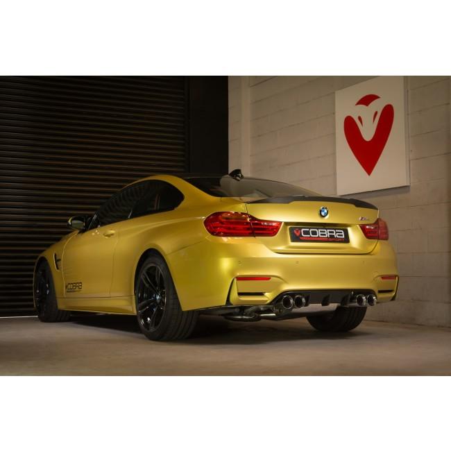 Cobra Sport BMW M4 F82 coupe 3-inch valved primary cat back performance exhaust system installed on the vehicle's rear.