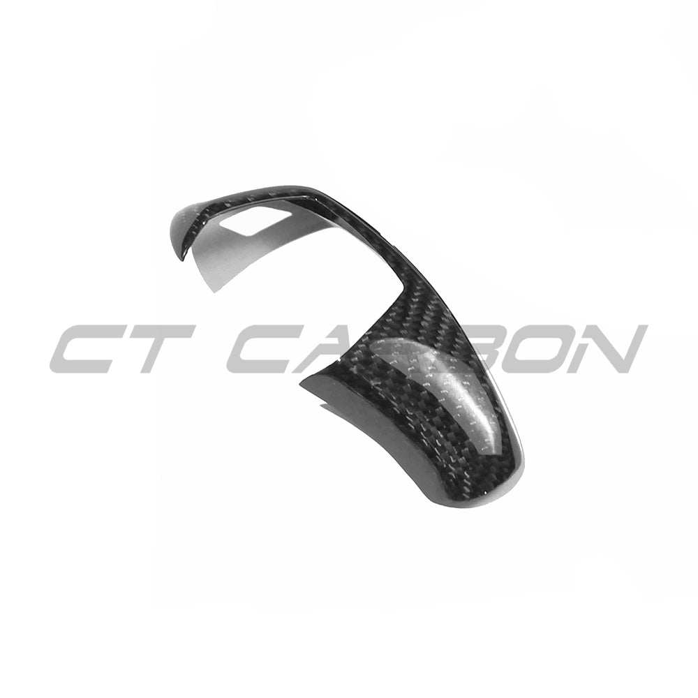 Carbon fiber BMW Fxx ZF shifter cover for LHD models, by CT Carbon, shown on a sleek BMW vehicle interior.