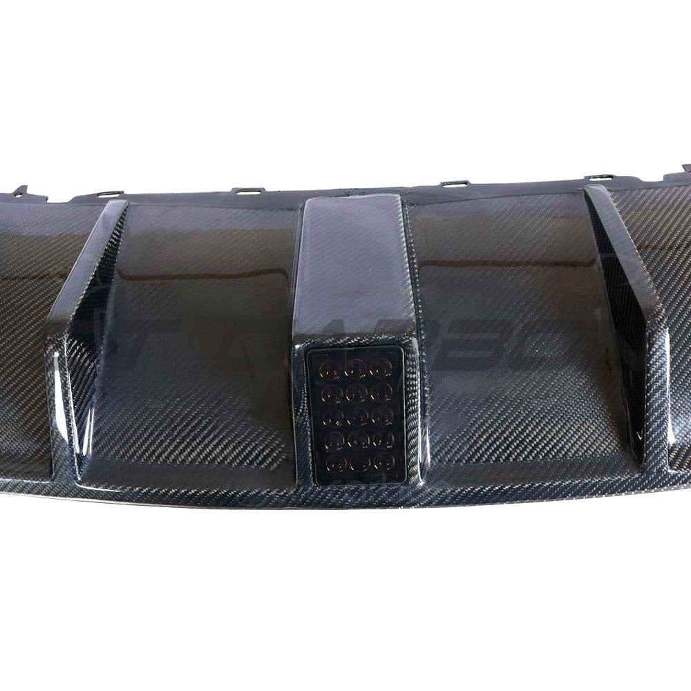 CT Carbon Audi RS3 8V saloon rear carbon diffuser with DTM light, showcasing sleek aerodynamic design and carbon fiber finish.
