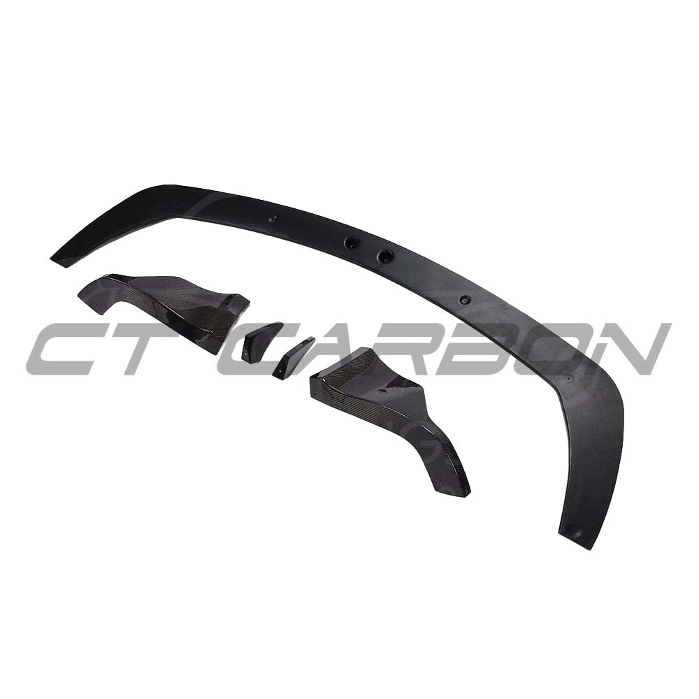 Carbon fiber diffuser for Toyota Supra 2019+ A90 by CT Carbon, shown installed on the vehicle's rear for enhanced aerodynamics.