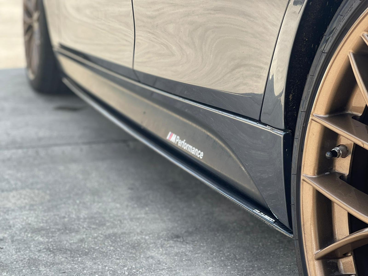 BMW F30 3 Series Saloon full carbon fiber kit by CT Carbon, including front and rear bumper accents and side skirts.