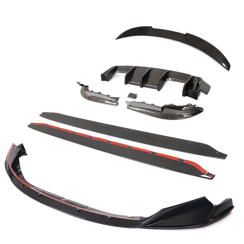 BMW G82 M4 full carbon fibre kit by CT Carbon, including body panels and accessories, showcasing a sleek, lightweight carbon fibre finish.