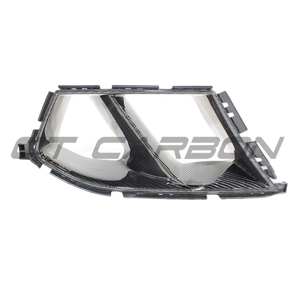 BMW M3 M4 G80 G82 G83 carbon fiber front end pack by CT Carbon, featuring bumper ducts and sporty styling.