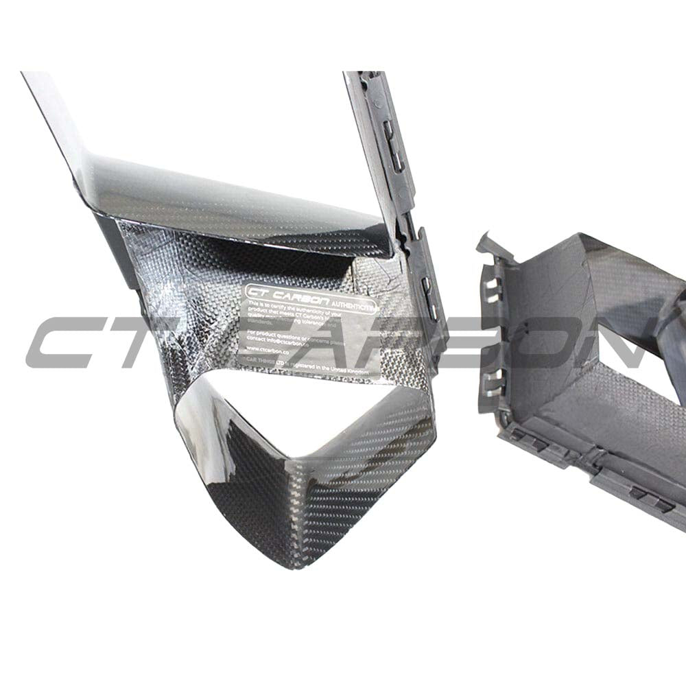 BMW M3 M4 G80 G82 G83 carbon fibre bumper ducts by CT Carbon, showcasing sleek, lightweight automotive accessories.