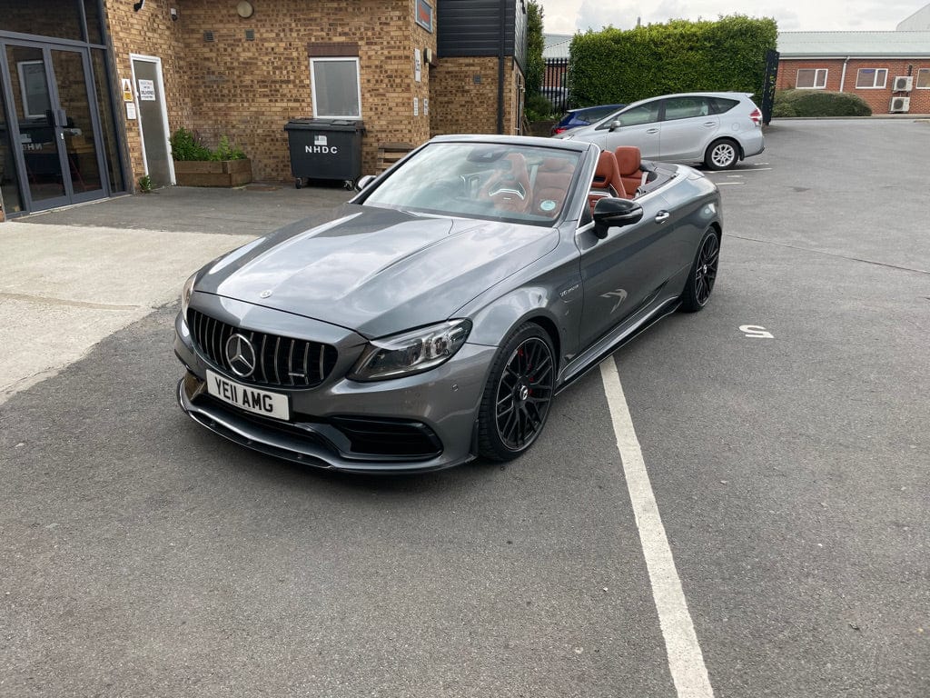 Full Mercedes C63 W205 2015-2018 coupe carbon fibre kit by CT Carbon, showing aerodynamic components and finish details.