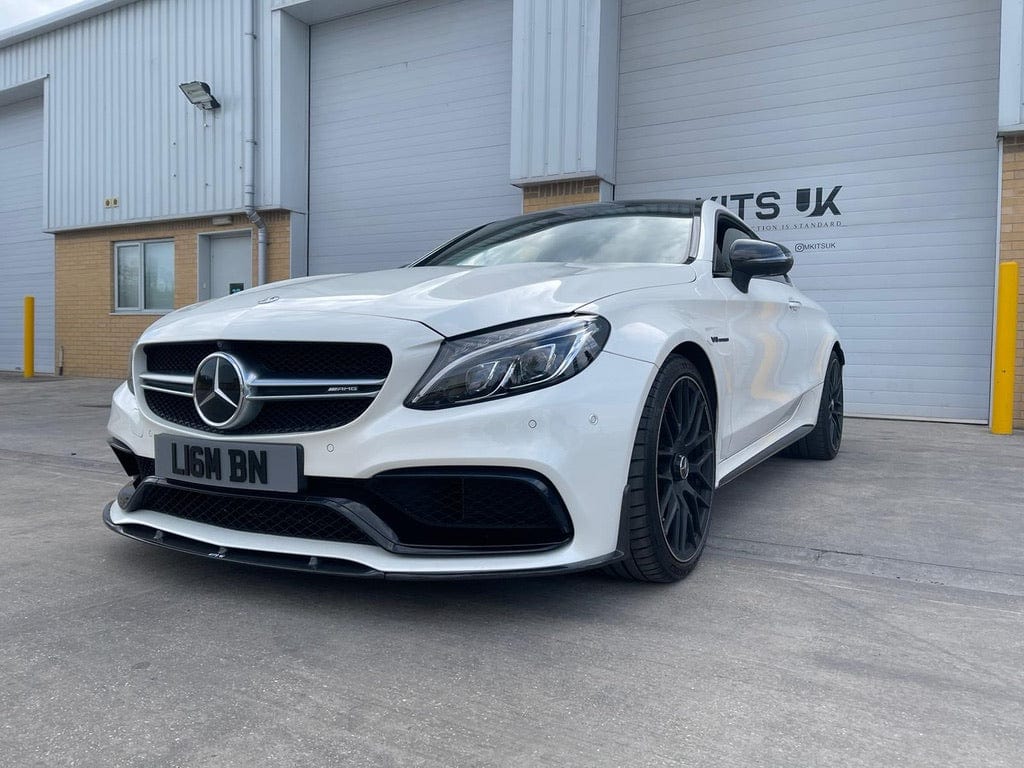 CT Carbon Mercedes C63 W205 2015-2018 coupe full carbon fiber kit installed on the car's exterior, showcasing sleek, lightweight carbon details.