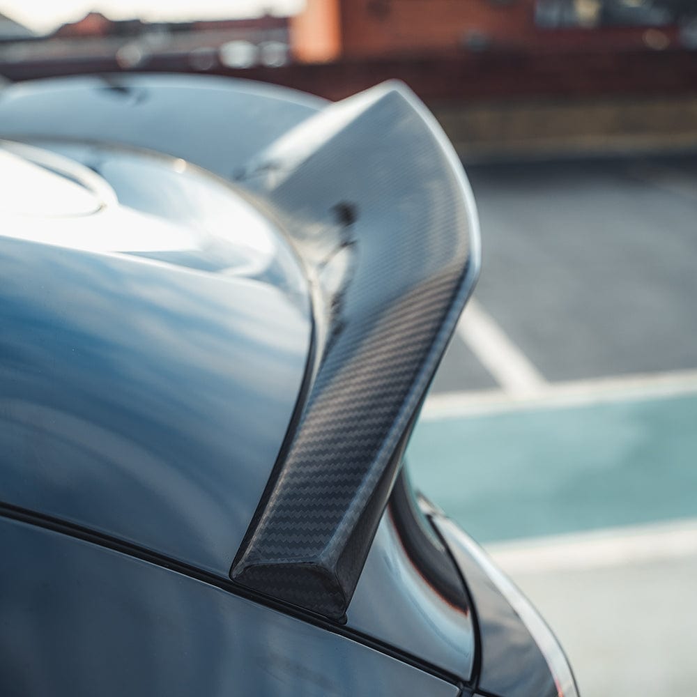 CT Carbon full carbon fiber kit for Tesla Model Y MK1 2020-2025, including exterior body parts, in a sleek black finish.