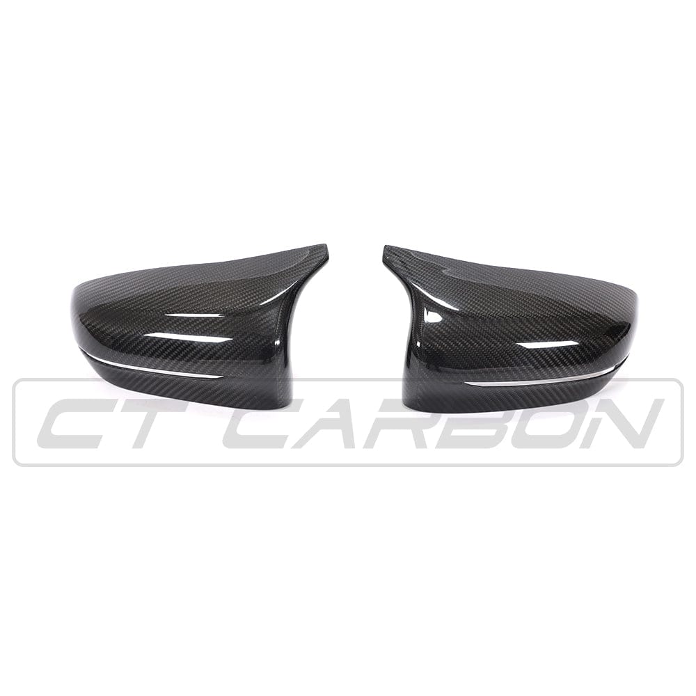 BMW F90 M5 M5C Competition carbon fibre mirror overlay by CT Carbon, RHD side, sleek, high-performance car accessory.