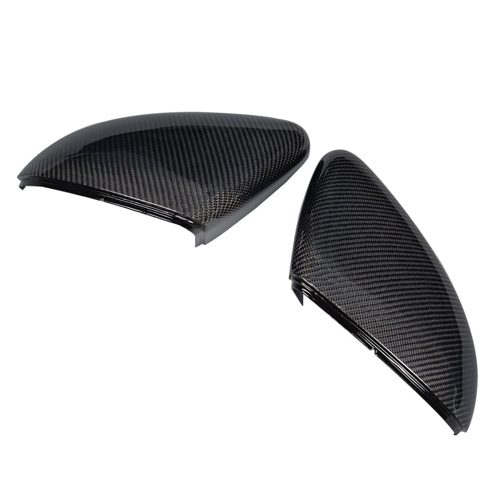 Volkswagen Golf MK7/7.5 CT Carbon pre-preg carbon fiber mirror replacements, showing sleek, lightweight car accessory with reflective surfaces.