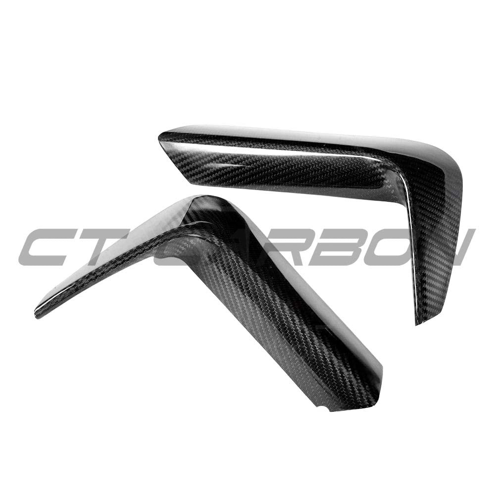 BMW M3 and M4 F80, F82, F83 carbon fibre rear bumper canards by CT Carbon, shown installed on the vehicle.