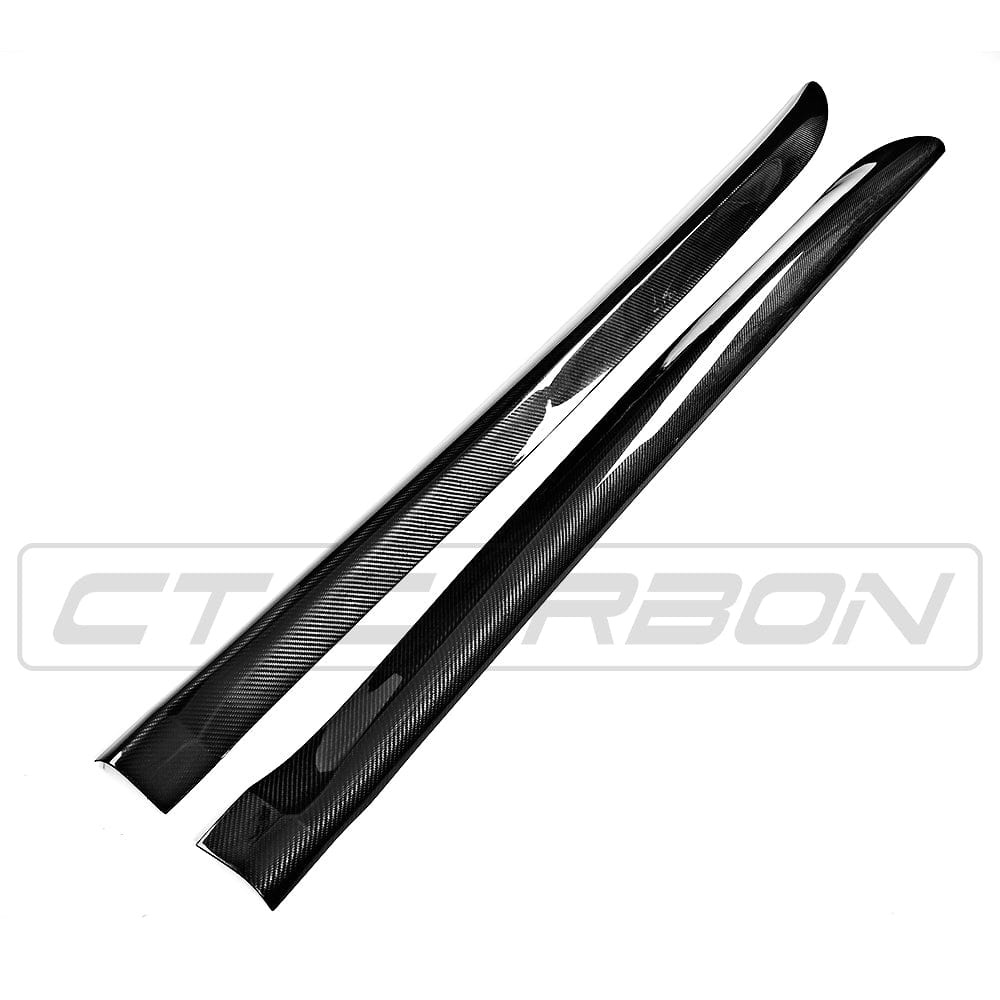 BMW F15 F85 X5 X5M carbon fibre side skirts by CT Carbon, shown installed on the vehicle for a sleek, sporty look.