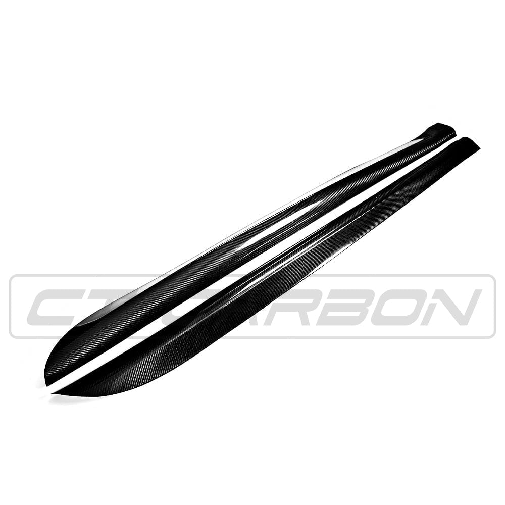 BMW F15 F85 X5 X5M carbon fibre side skirts by CT Carbon, showing sleek, textured side skirts installed on the vehicle.