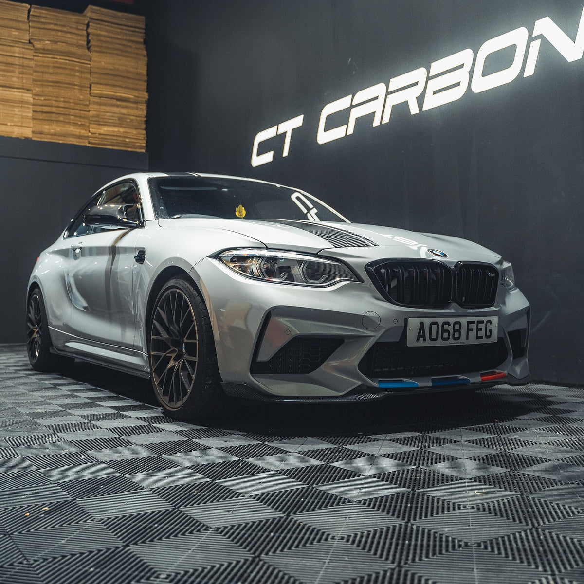 BMW M2 F87 carbon fibre side skirts by CT Carbon, featuring a 3D-style design for enhanced sporty appearance.