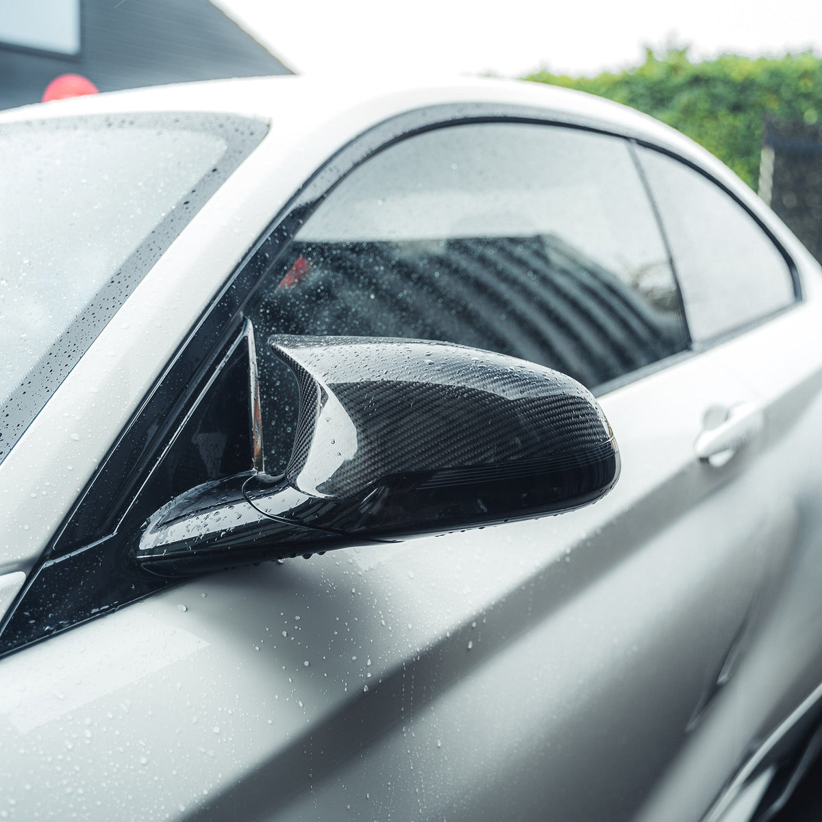 BMW F80/F82/F83/F87 M2C M3 M4 carbon fibre mirrors for RHD, designed as sleek accessories by CT Carbon.