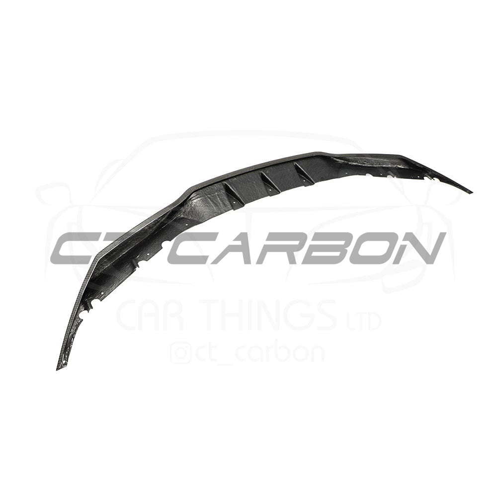 BMW F90 M5 Competition carbon fiber splitter by CT Carbon, showcasing the sleek R-style design on a sporty car.
