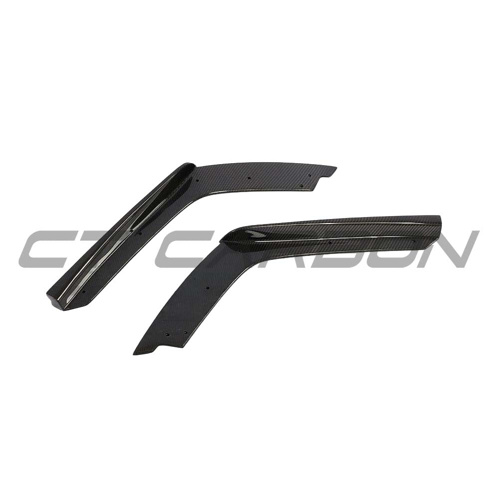 Carbon fiber rear bumper corners for BMW M3 M4 F80 F82 F83 by CT Carbon, close-up showing sleek automotive accessory design.