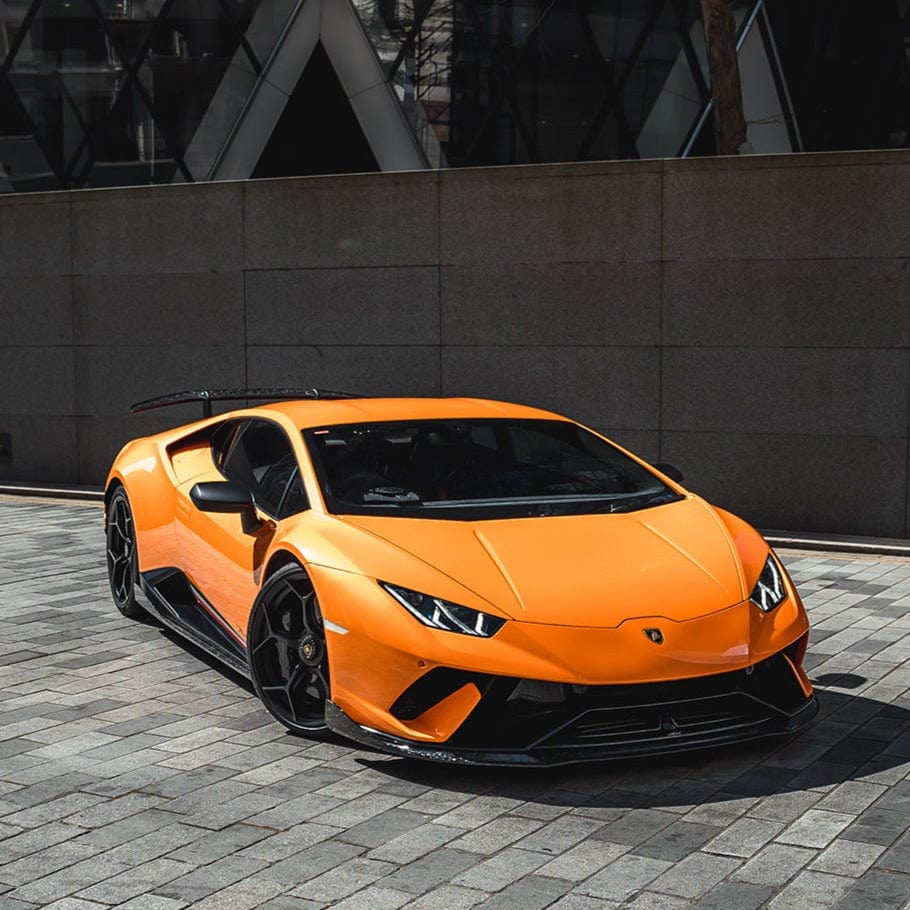 CT Carbon Lamborghini Huracan Performante forged splitter, lightweight aerodynamic car part with carbon fiber finish.