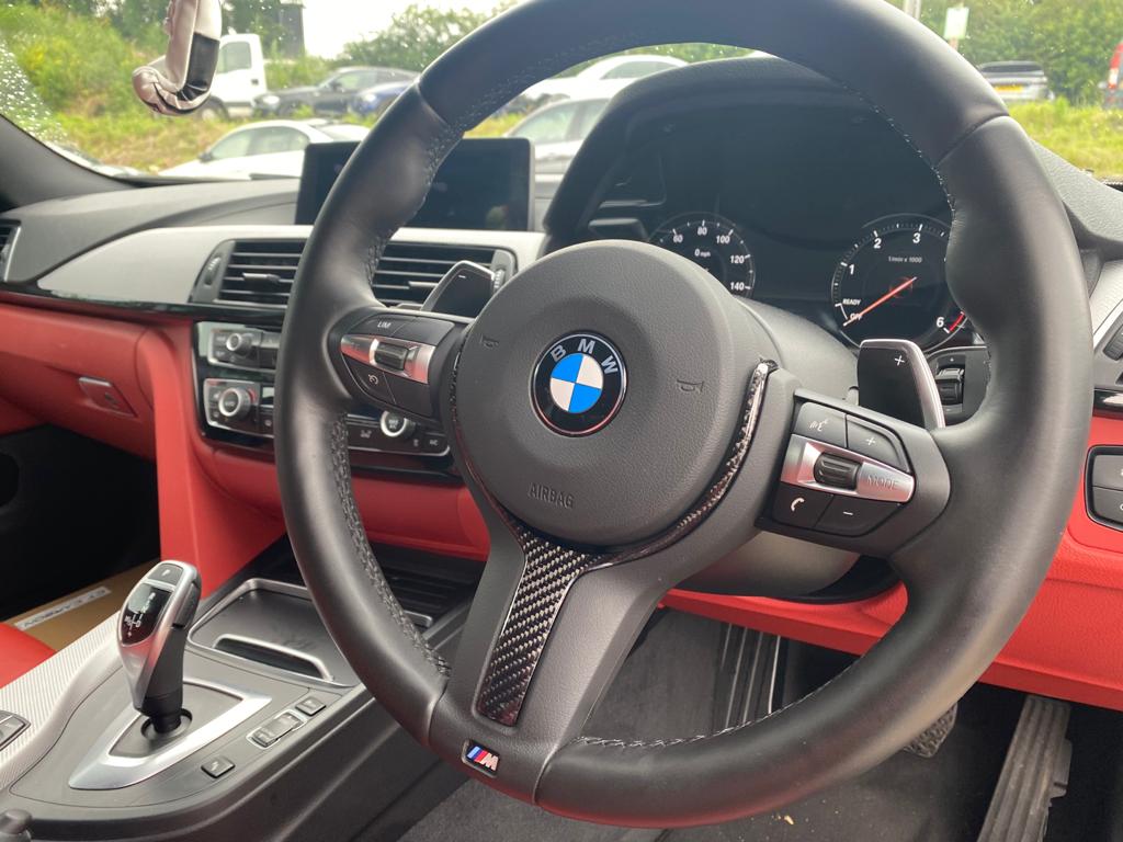BMW M Sport Fxx carbon fiber steering wheel trim accessory by CT Carbon, designed for 2012-2019 BMW models.