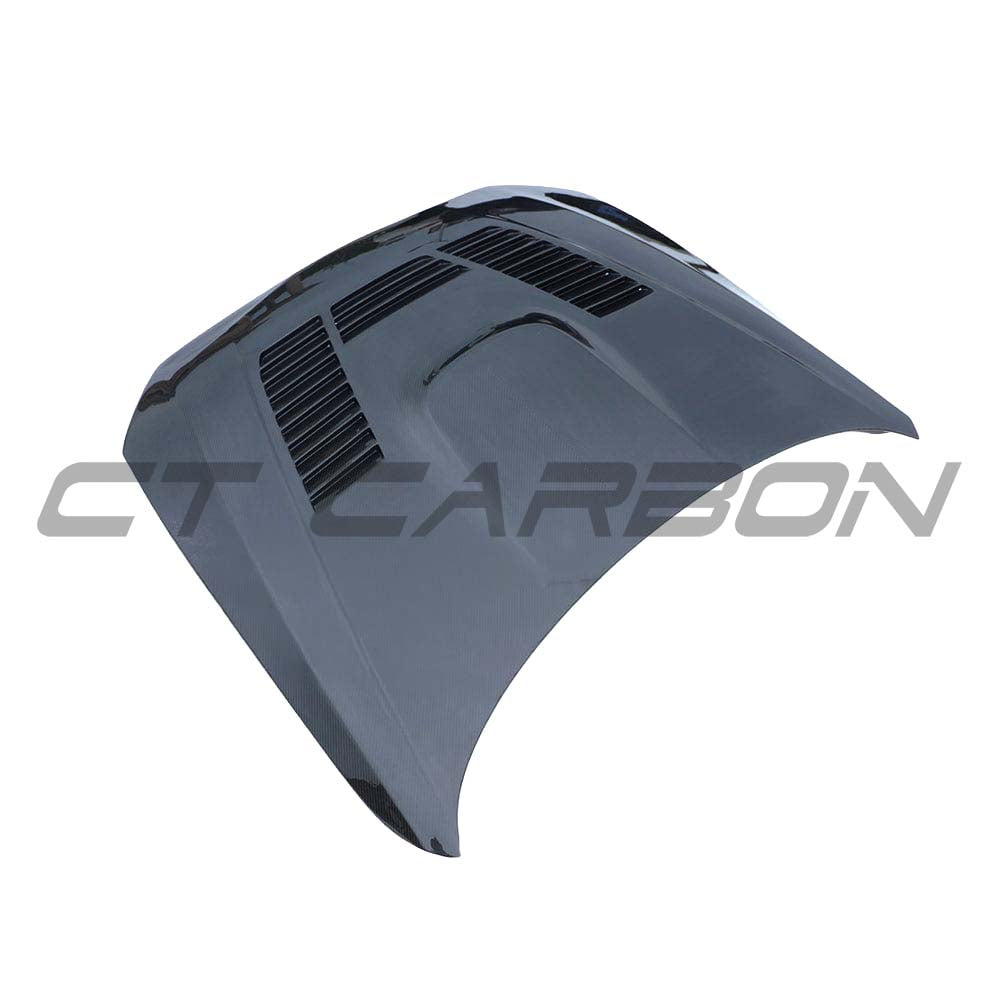 BMW F87 M2 Carbon Fibre Bonnet kit by CT Carbon, showcasing the sleek, lightweight carbon fiber hood on the sports car.