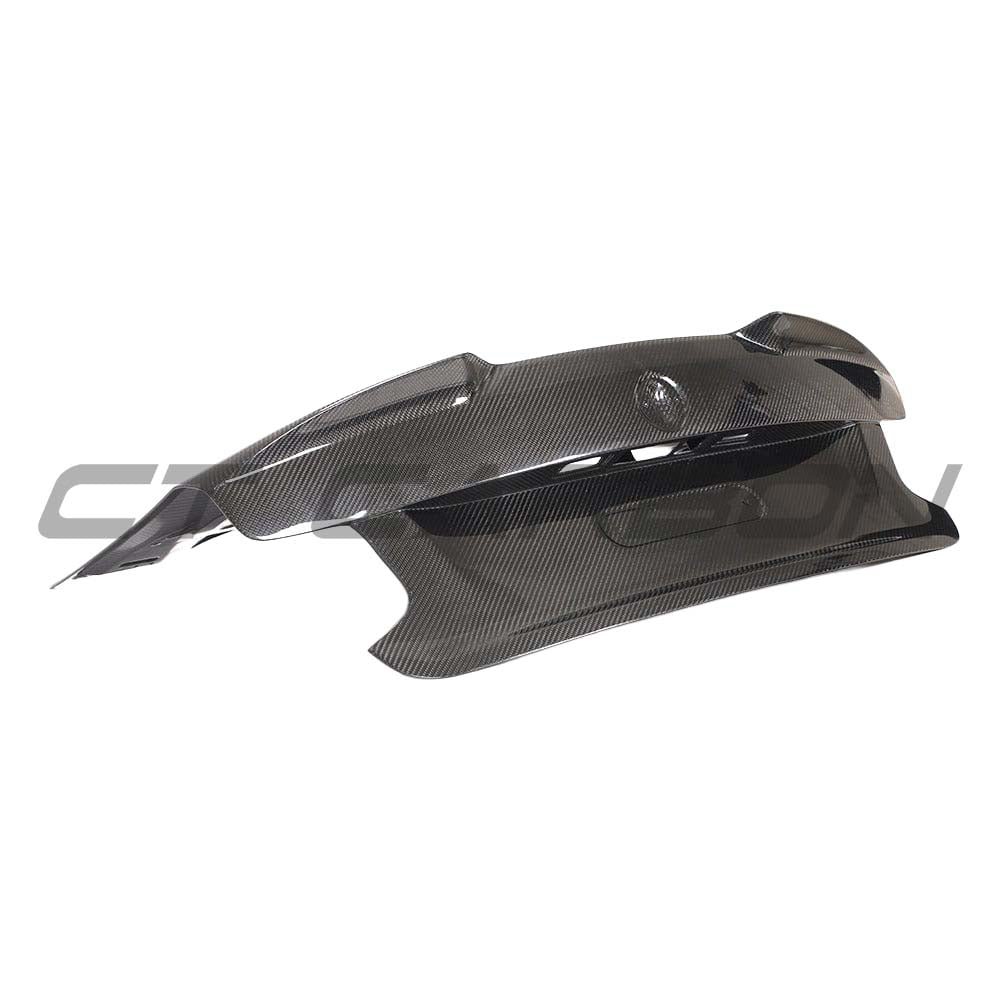 BMW F87 M2 carbon fibre full car kit by CT Carbon, including bootlid and body parts, showcasing lightweight, high-performance design.