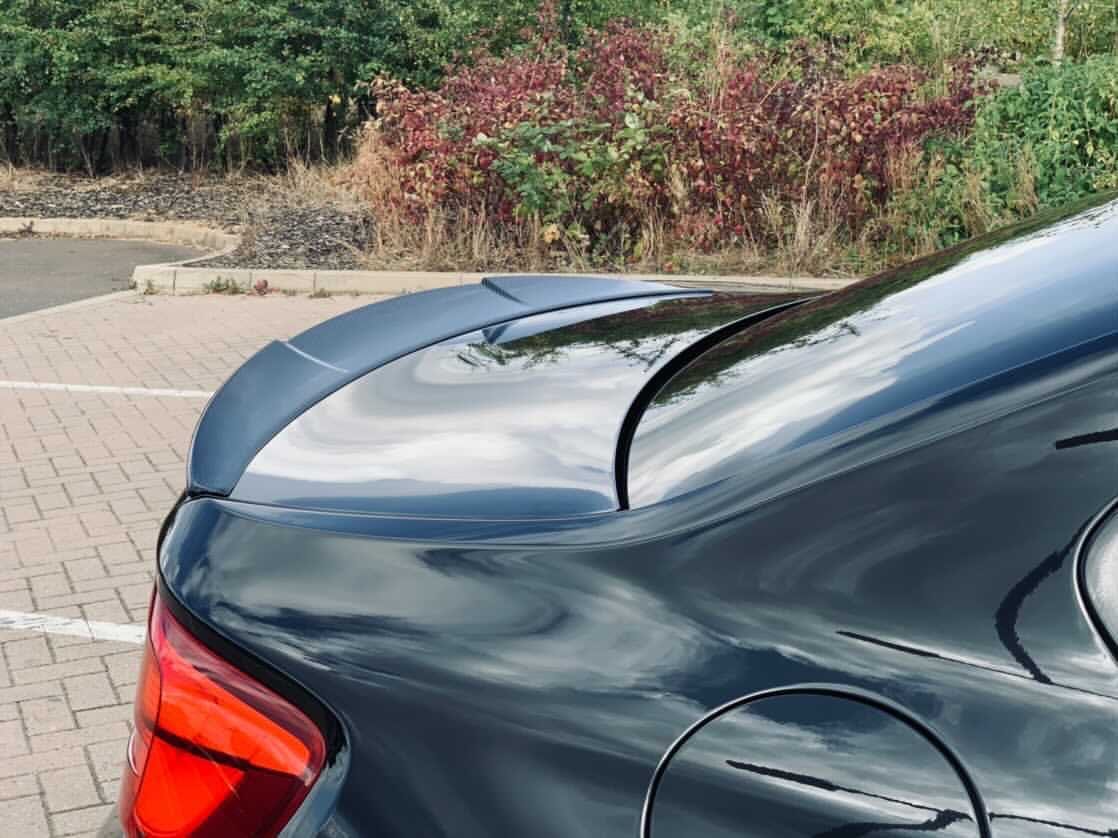 BMW M2 F87 M2C F22 carbon fibre spoiler by CT Carbon, showcasing sleek ARK style design on the car's rear.