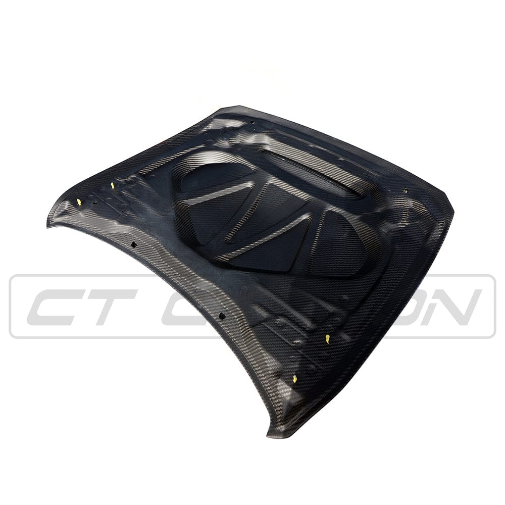 BMW M3 M4 F80 F82 F83 carbon fibre bonnet by CT Carbon, GTS style, showcasing lightweight, aerodynamic car hood design.