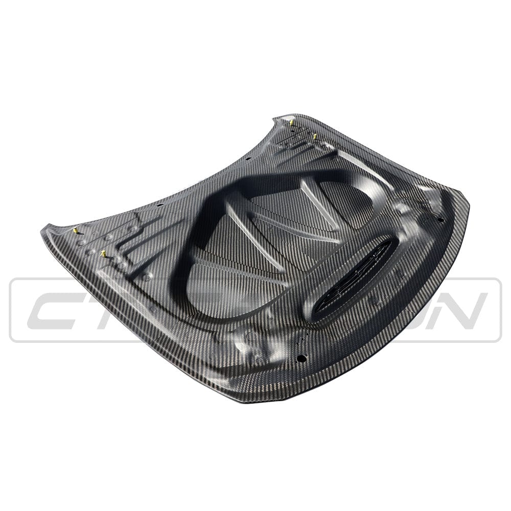 BMW M3 M4 F80 F82 F83 carbon fibre bonnet by CT Carbon, GTS style, showcasing lightweight, aerodynamic car hood design.