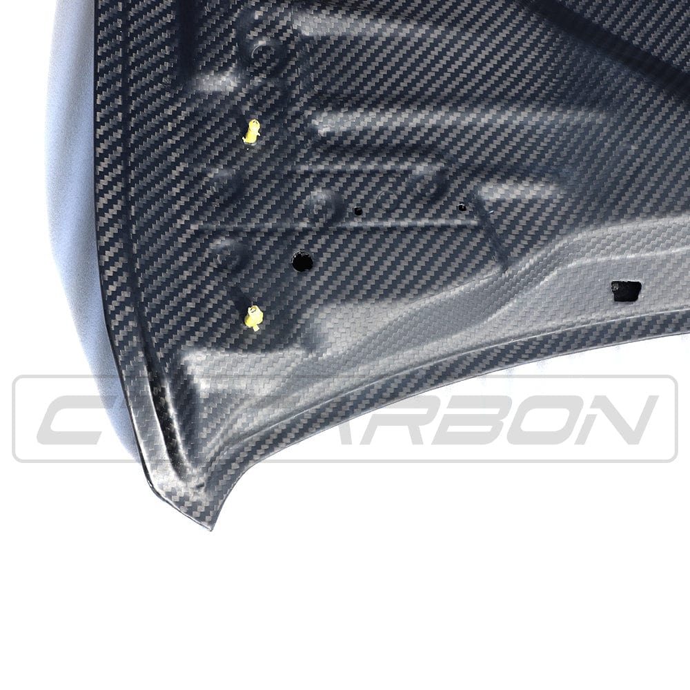 BMW M3 M4 F80 F82 F83 carbon fiber bonnet by CT Carbon, GTS style, showcasing lightweight, high-performance vehicle hood.