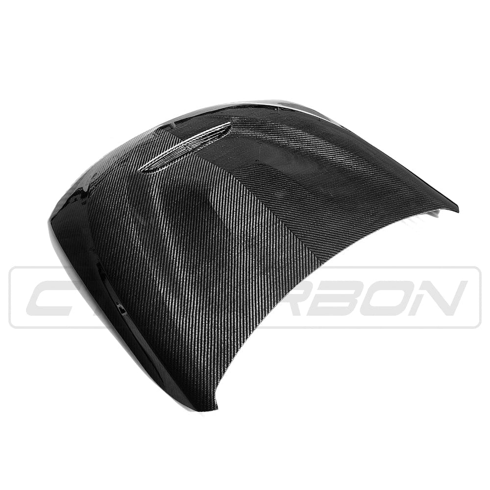 BMW M3 M4 F80 F82 F83 carbon fibre bonnet by CT Carbon, featuring a GTS style design on a sleek sports car.