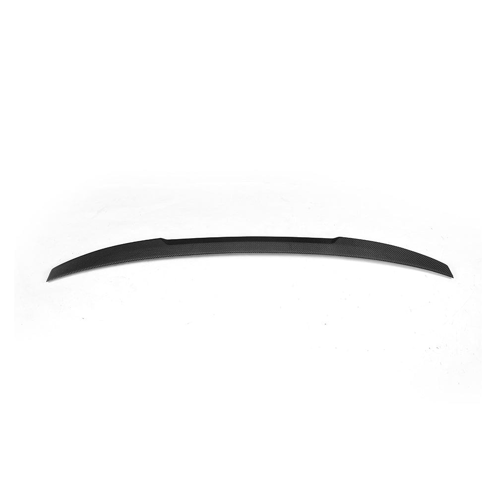 BMW M5 F90 and G30 5 Series carbon fiber spoiler by CT Carbon, M4 style, shown on vehicle with sleek, aerodynamic design.