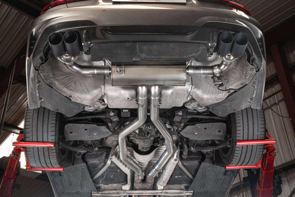 Scorpion BMW G20 G21 M340i xDrive half exhaust system with electronic valve, showcasing stainless steel piping and muffler components.