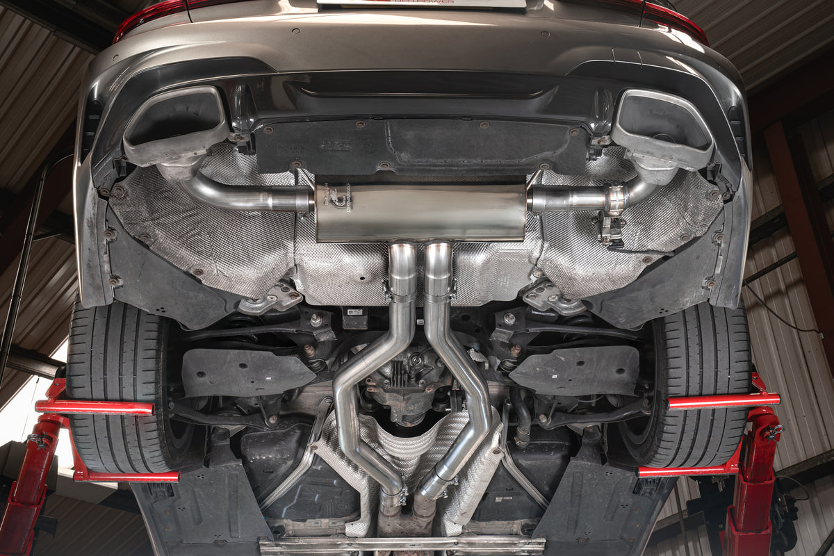 Scorpion BMW G20 G21 G22 M340i xDrive half exhaust system with electronic valve, showcasing polished metal piping and dual exhaust tips.