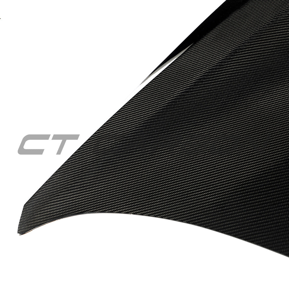 BMW F87 M2, M2C, F20, F22 carbon fiber bonnet from CT Carbon, showing the sleek, lightweight hood with detailed carbon fiber weave.