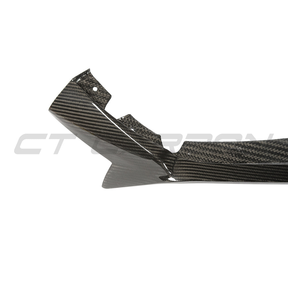 BMW F95 X5M 2023+ CT Carbon carbon fiber splitter installed on front bumper, showcasing sleek, aerodynamic design.