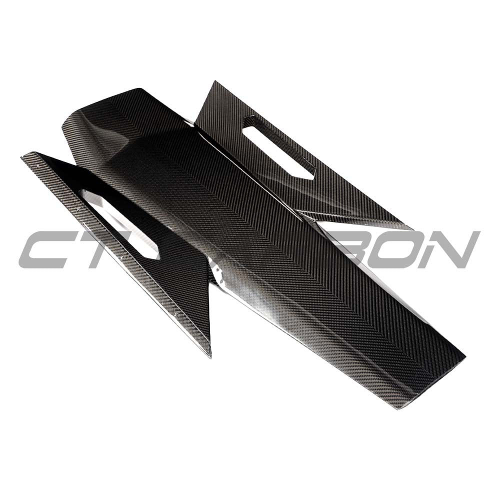 CT Carbon Lamborghini Revueltó carbon fiber engine cover and roof scoop, showcasing sleek, lightweight design and high-performance materials.