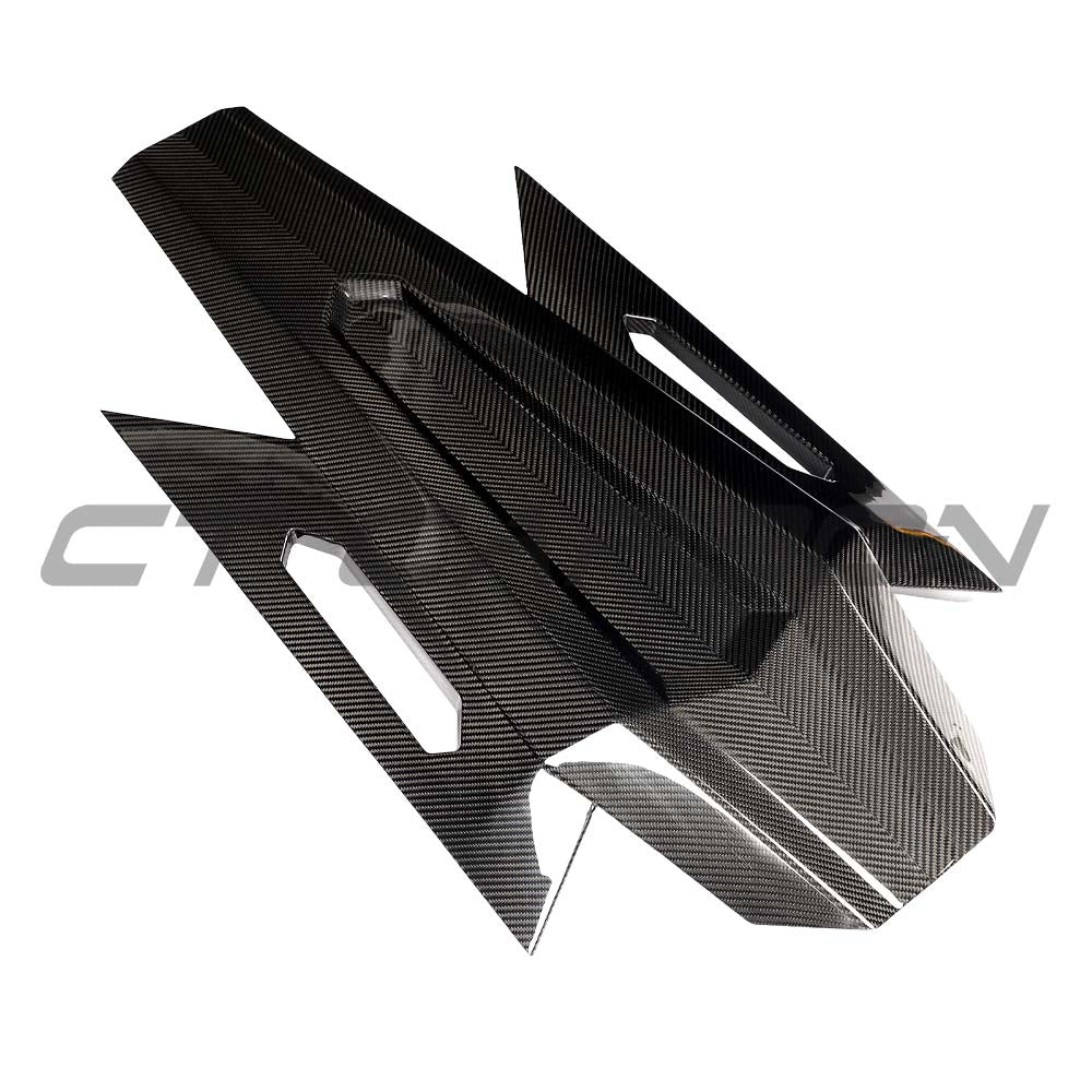 Lamborghini Revueltto carbon fibre engine cover and roof scoop by CT Carbon, showing sleek design and textured finish.