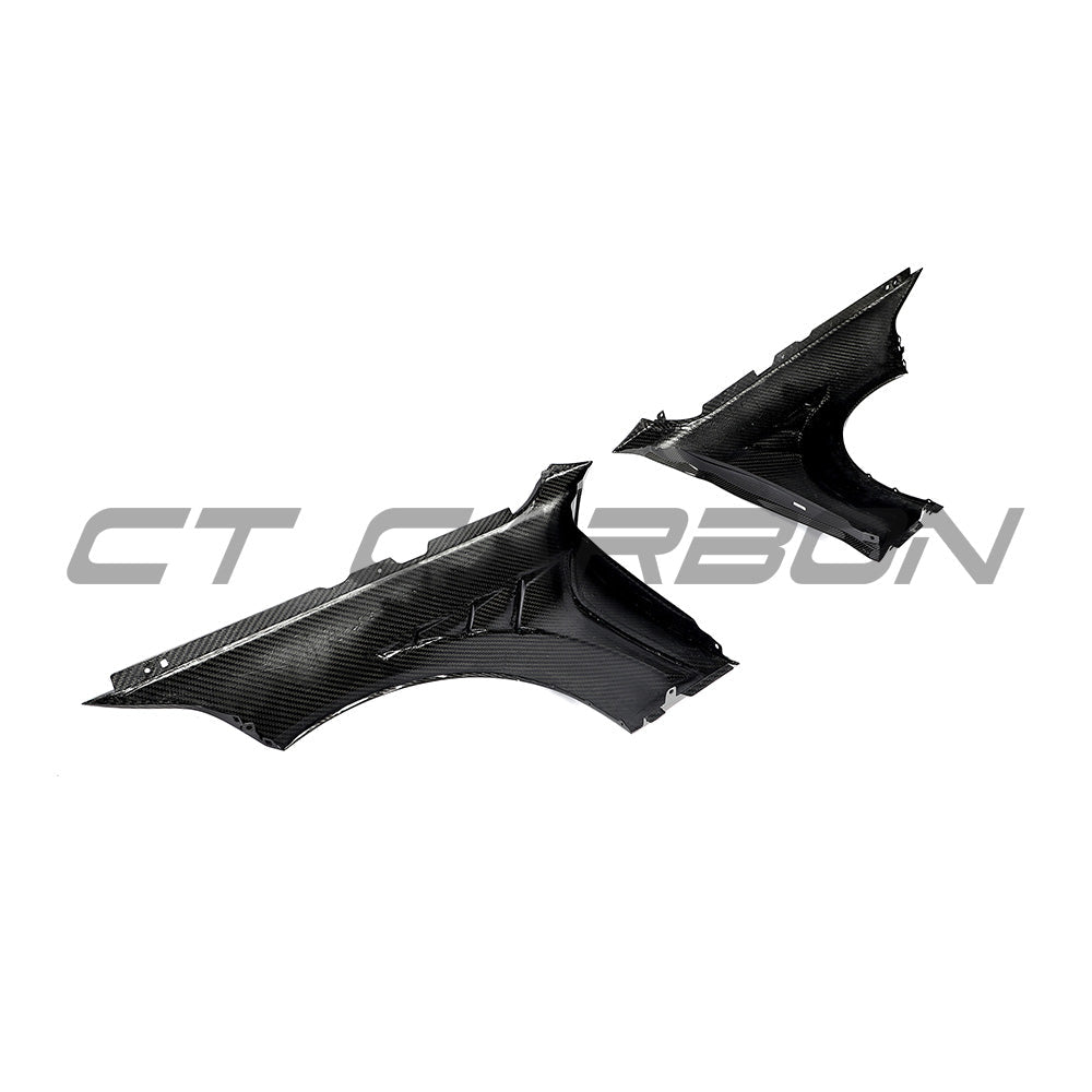 BMW F87 M2 carbon fibre fenders by CT Carbon, showing close-up of sleek, lightweight front fenders on the sporty M2 model.