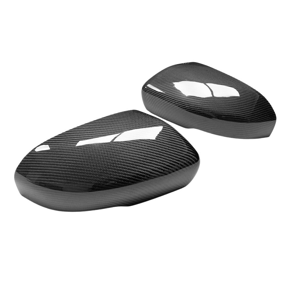 Carbon fiber side mirror covers for Land Rover Evoque L538 2012-2013 by CT Carbon, showcasing sleek, textured finish on mirrors.