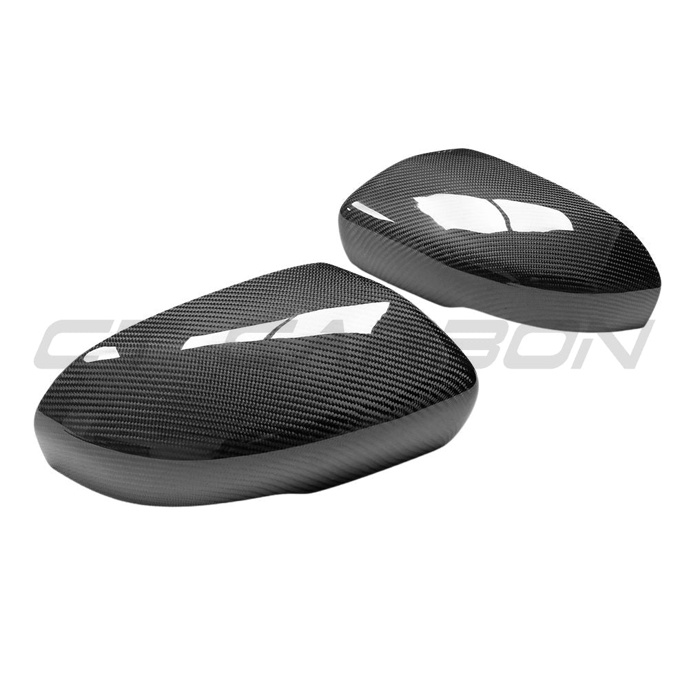 Carbon fiber side mirrors for Land Rover Evoque L538 2012-2013 by CT Carbon, showing sleek, aerodynamic mirror covers.