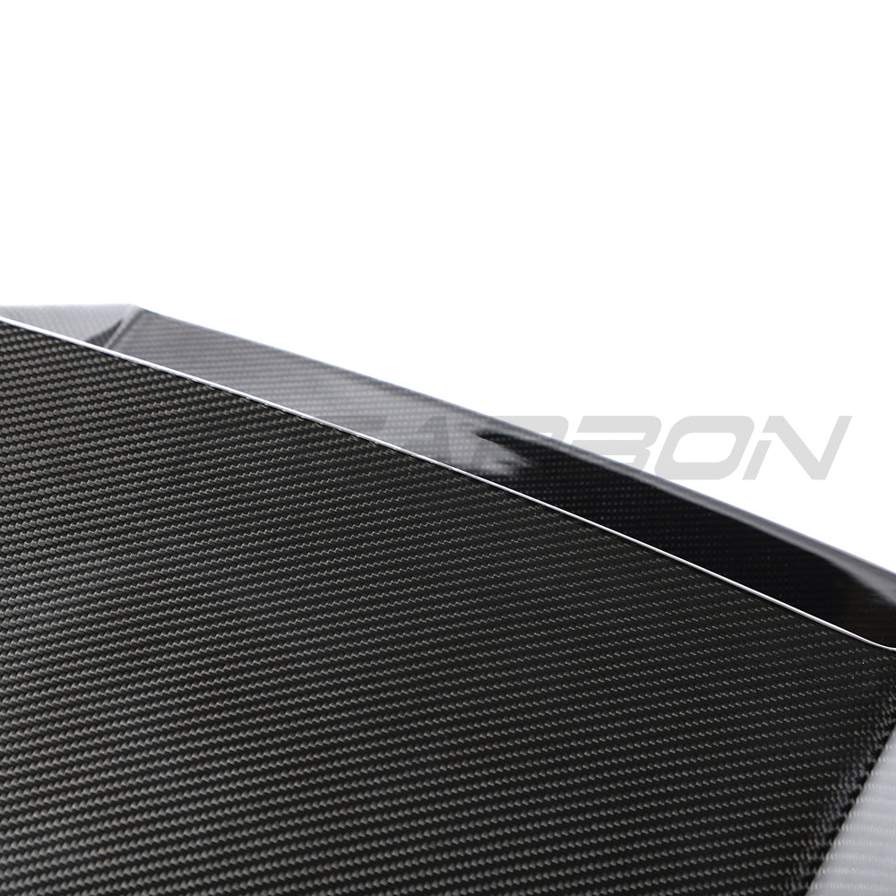 Carbon fibre roof scoop accessory for McLaren 570S and 570GT by CT Carbon, shown on the car's roof.