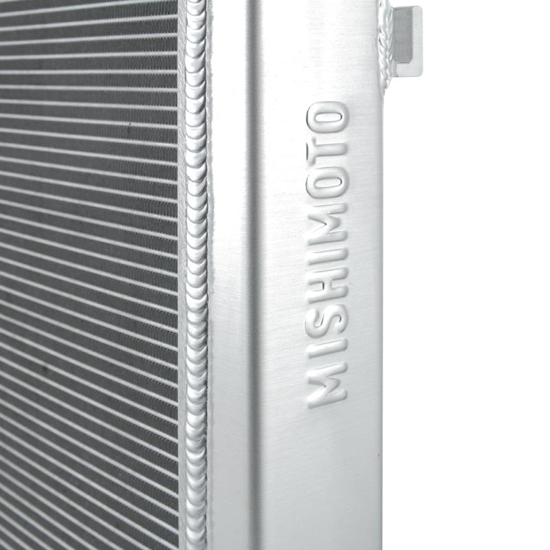 MISHIMOTO aluminum radiator for Volkswagen MK7 Golf TSI/GTI 2015+ showing sleek, durable radiator with cooling fins and mounting points
