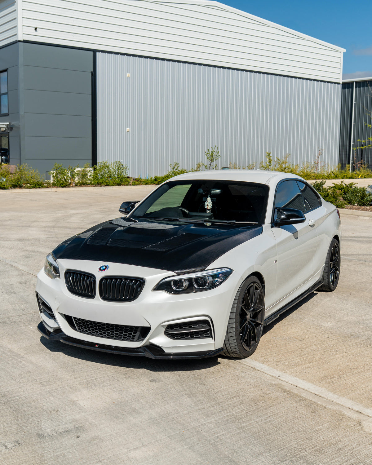 BMW M2 M2C F87 and 1 Series F20 F22 carbon fibre car bonnet, lightweight and sleek replacement for sporty performance.