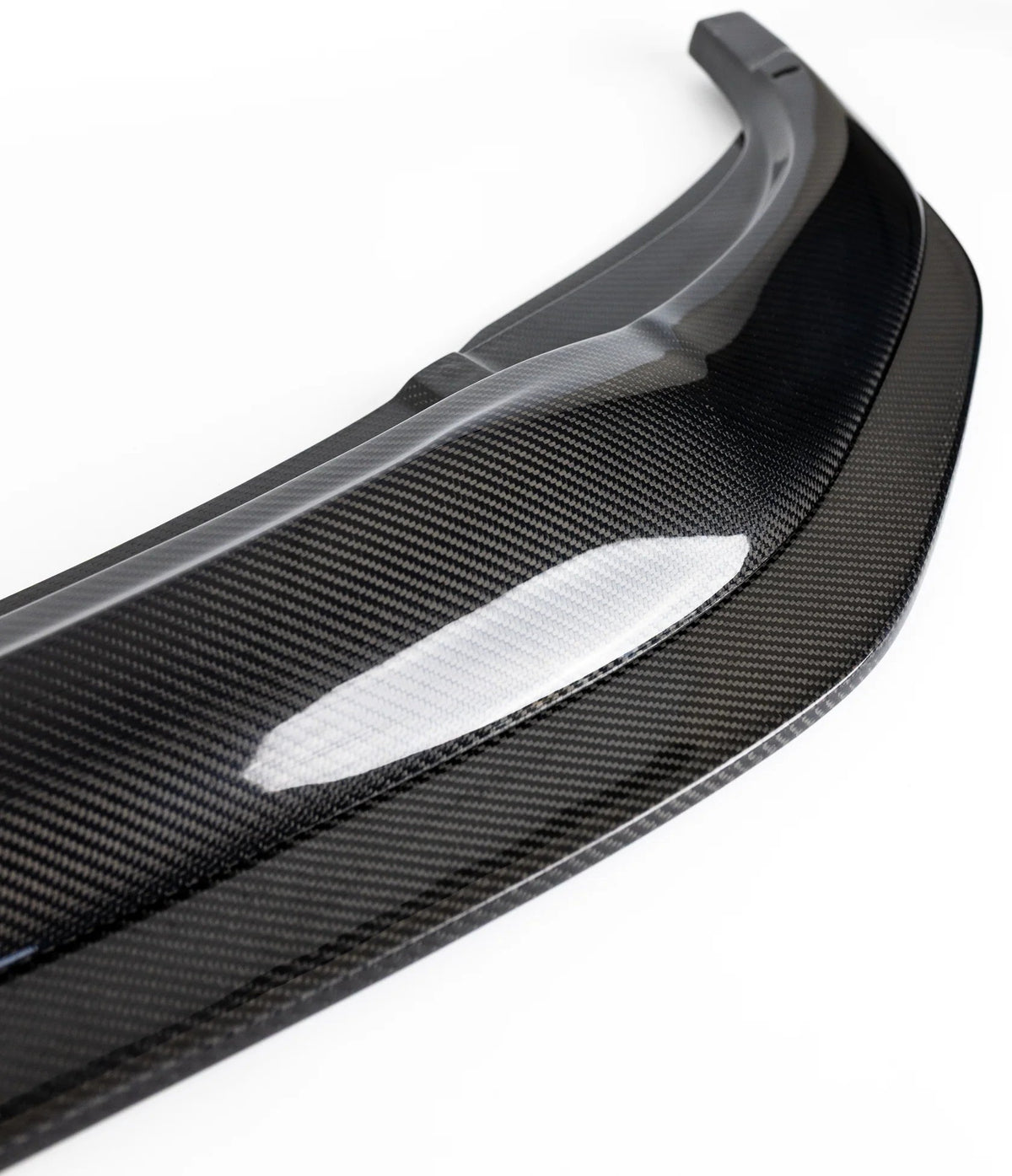 Ridgeline Motorsport carbon fibre GTS front splitter on a BMW M2 Competition F87, showcasing its aerodynamic design and finish.