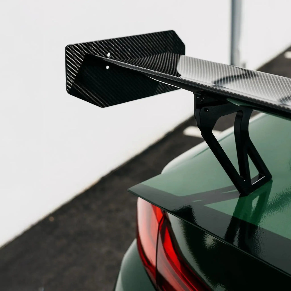 Ridgeline Motorsport Ring Spec Wing V2 spoiler made of dry carbon with autoclaved pre-preg construction, designed for performance cars.