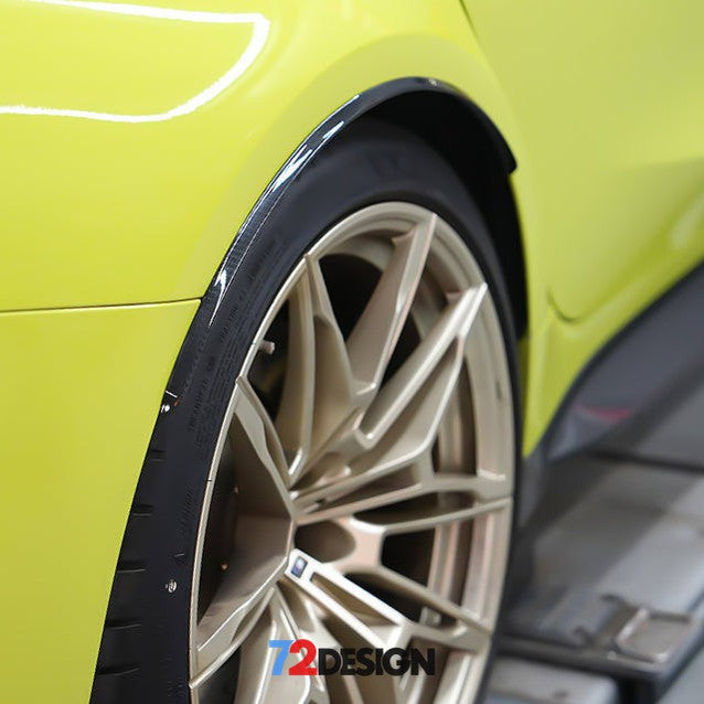 BMW M3 G80 G81 carbon fibre rear arch guards by 72Design, close-up view showing sleek black finish and precise fitment.