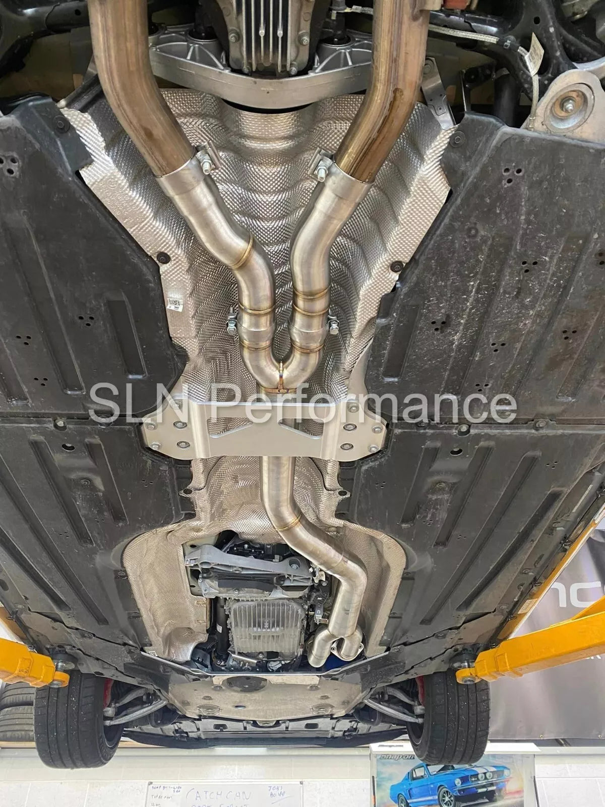 SLN Performance BMW S58 M3 G80 M4 G82 X3M X4M LCI single mid pipe center section with under-brace, made for performance exhaust upgrade.