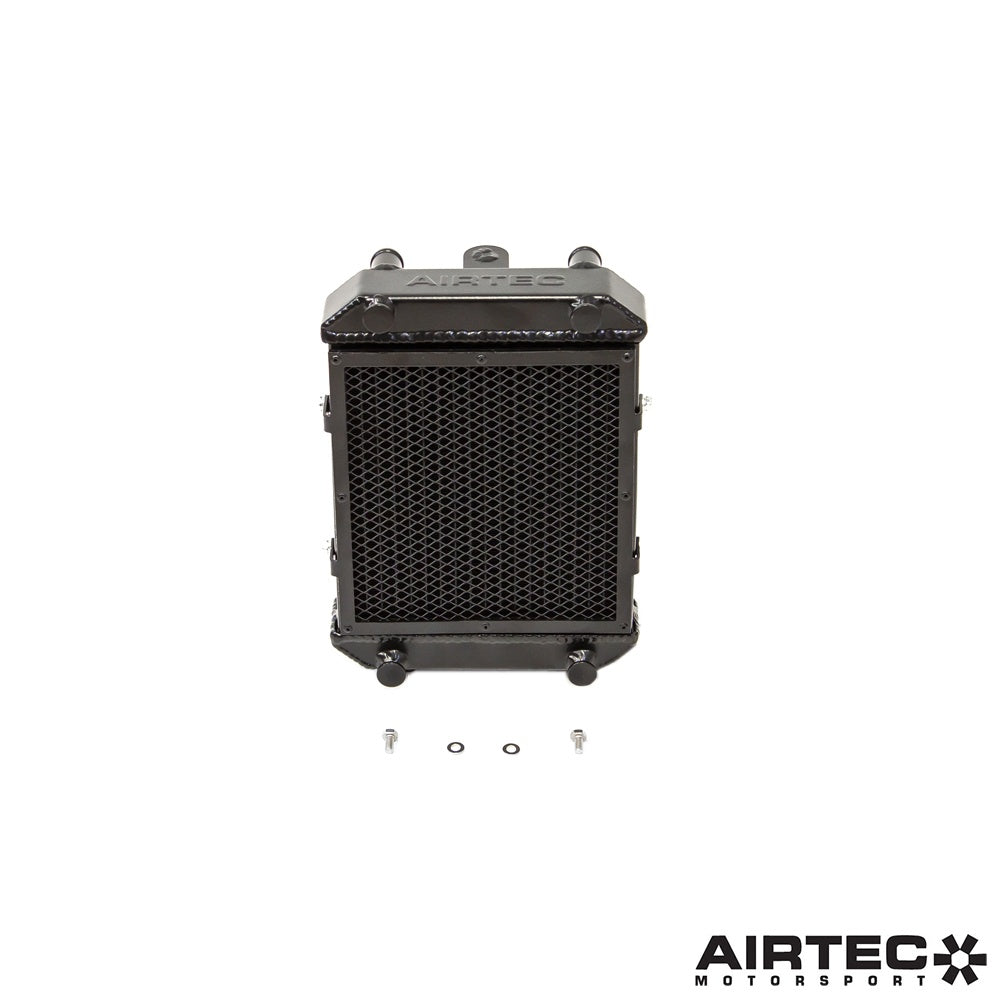 Airtec Motorsport auxiliary radiators for 1.8 and 2.0 TSI EA888 Gen 4 engines, shown installed in a vehicle engine bay.