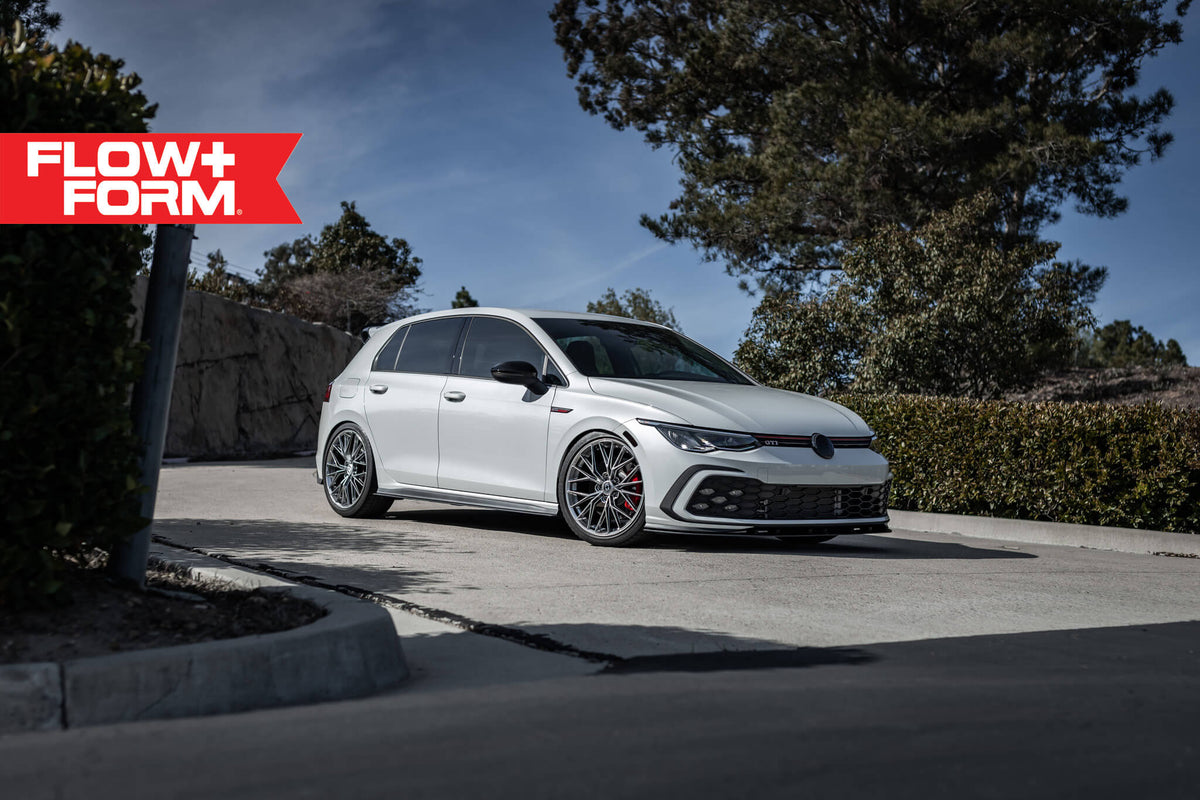 HRE PERFORMANCE WHEELS FF28 alloy wheels with multi-spoke design and polished finish on a vehicle.