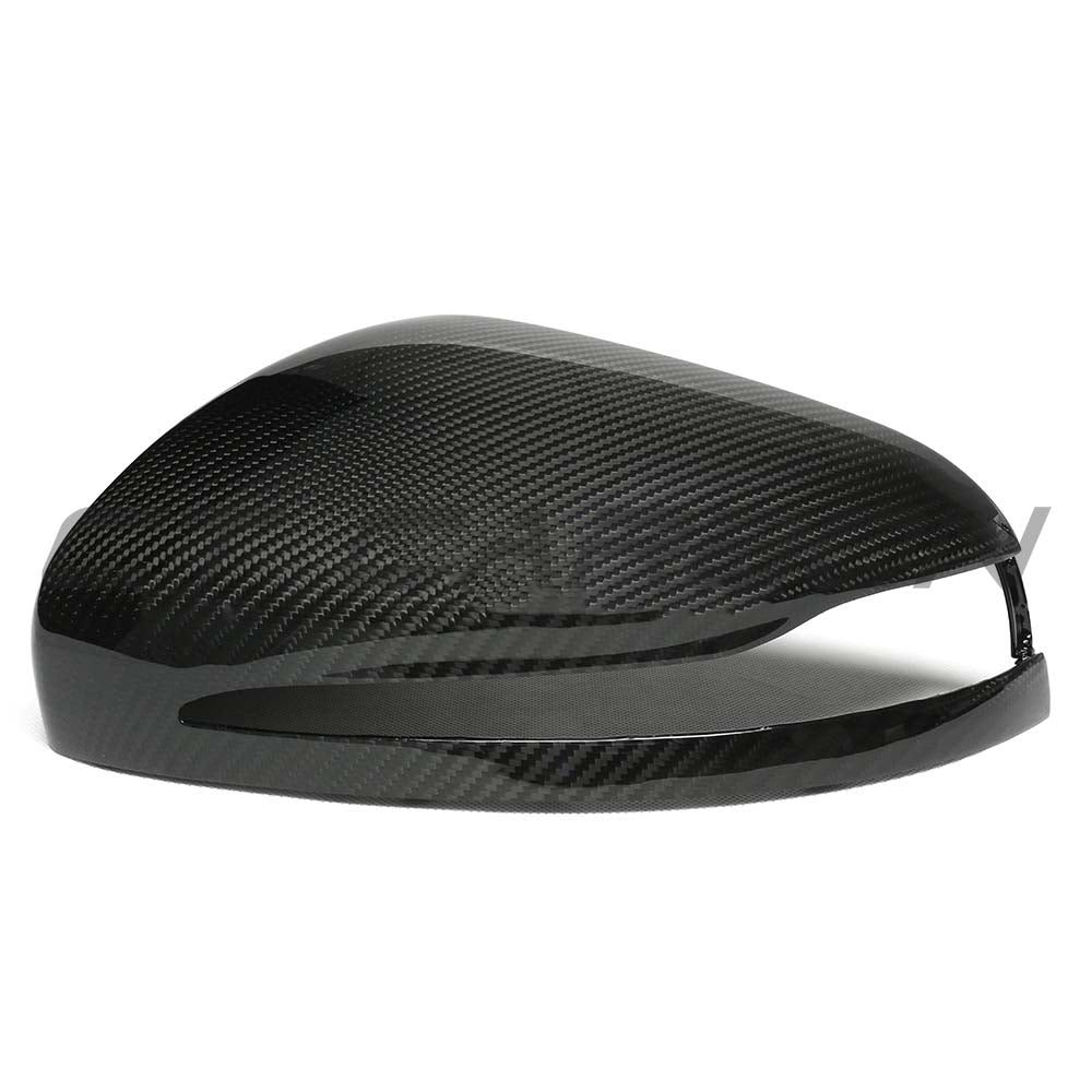 Mercedes G-Class W464 2022+ mirror cover replacements by CT Carbon in dry carbon fiber, showing close-up of sleek mirror covers.